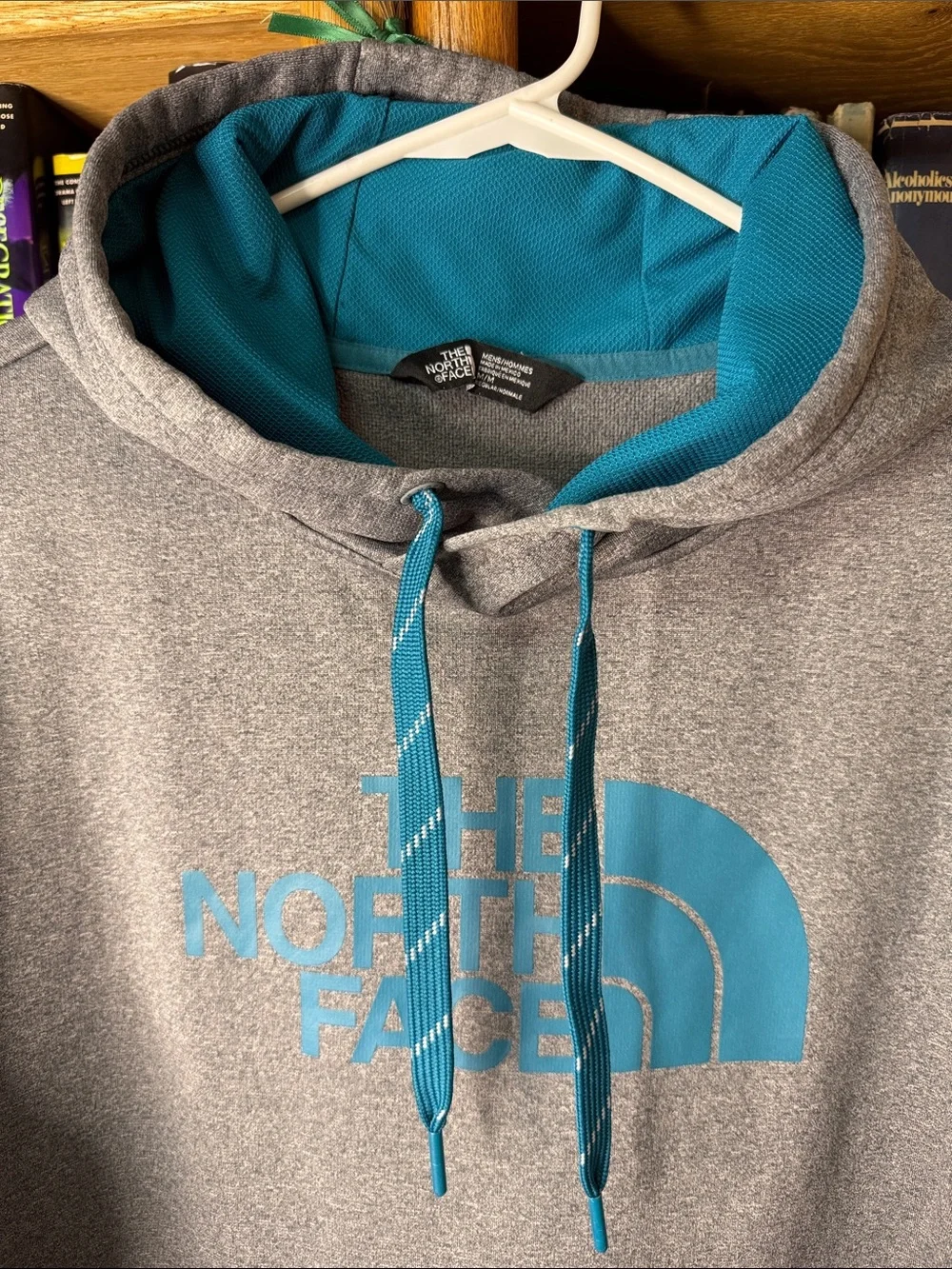 The North Face Men’s Heather Gray Pullover Hoodie with Teal Logo